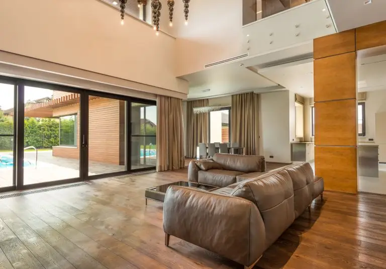 Living room with large lift and slide glass doors